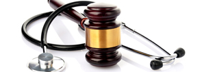 concept about medical lawsuit, stethoscpe and gavel on white background