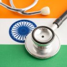 Stethoscope on India flag, Business and finance.
