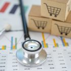 Stethoscope and shopping cart logo on box with graph background. Banking Account, Investment Analytic research data economy, trading, Business import export transportation online company concept.