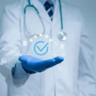 doctor-wearing-white-coat-gloves-600nw-2675224701